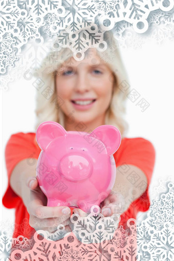 复合图像粉红色的小猪银行举行微笑有吸引力的女人