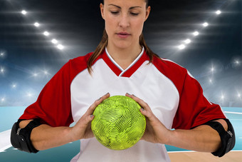 复合图像女运动员持有球