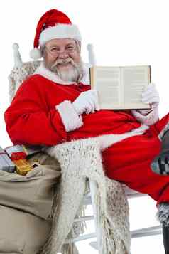 快乐圣诞老人老人显示圣经
