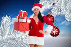 女人圣诞老人服装持有礼物圣诞节背景
