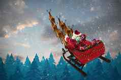 复合图像高角视图圣诞老人老人骑雪橇礼物盒子