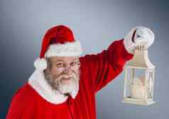 圣诞老人持有圣诞节灯笼