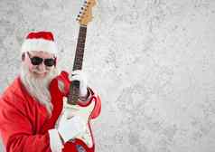 圣诞老人老人穿太阳镜玩吉他