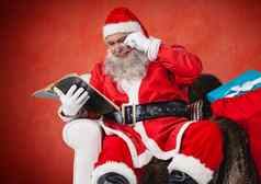圣诞老人老人阅读圣经
