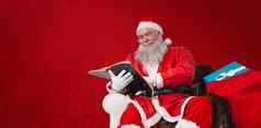 复合图像圣诞老人阅读圣经袋圣诞节现在