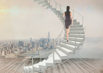 女人攀爬楼梯城市背景