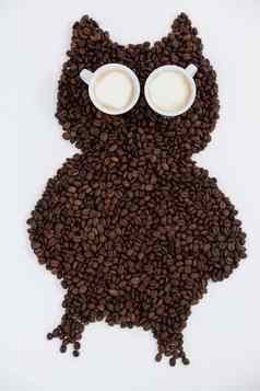 咖啡豆子杯形成猫头鹰