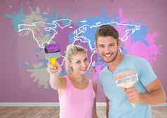 夫妇绘画色彩斑斓的地图油漆摊墙背景