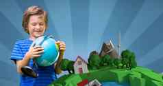 微笑男孩持有全球站图像地球地球蓝色的backeground