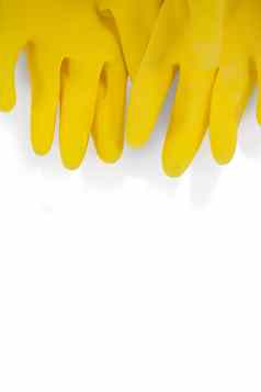 黄色的橡胶手套白色背景