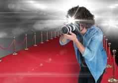 摄影师采取照片闪光红色的地毯耀斑