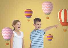 孩子们指出惊讶空白房间背景热空气气球