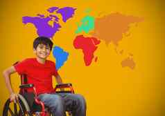 禁用男孩轮椅前面色彩斑斓的世界地图