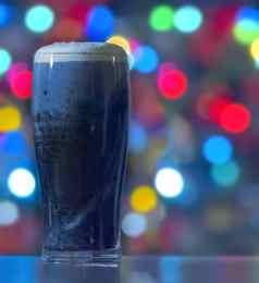 黑啤酒圣诞节灯背景吉尼斯黑暗爱尔兰干结实的