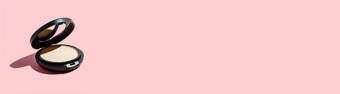 紧凑的粉粉红色的背景复制空间