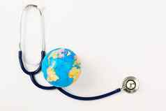 世界健康一天概念听诊器全球白色后台支持