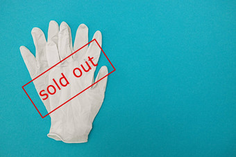 医疗外科手术手套蓝色的背景标志显示出售红色的文本冠状病毒恐慌购买短缺医疗手套问题股票医疗设备