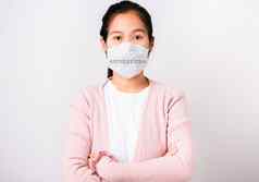 女人穿保护脸面具冠状病毒站