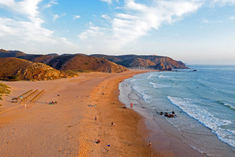 沙滩上亲爱的西海岸葡萄牙日落