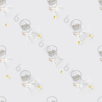 无缝的照片模式玻璃纯水黄色的药片太阳照透明的液体白色背景分散药物