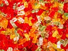色彩斑斓的橡皮糖熊前视图平躺背景美味的糖果