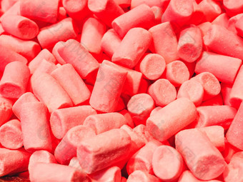 色彩斑斓的橡皮糖糖果前视图平躺背景美味的粉红色的糖果