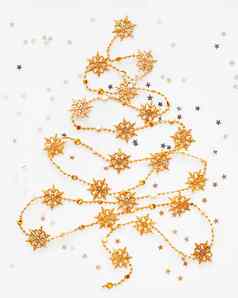 圣诞节树使金雪花加兰银明星