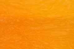 干黄色的杏纹理温暖的自然有机背景宏特写镜头