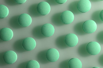 绿松石孤立的药片纹理医疗平板电脑背景宏特写镜头