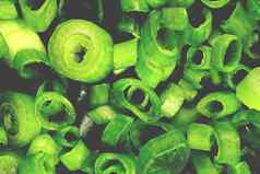 切片环块绿色洋葱新鲜的健康的蔬菜纹理素食者产品背景