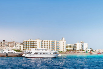赫尔加达海岸线酒店度假胜地建筑视图海景船红色的海埃及