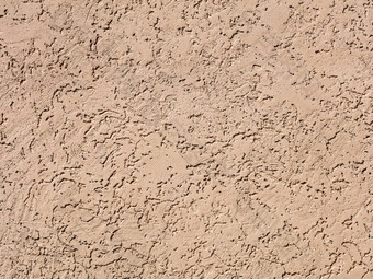 米色石膏墙石膏宽松的纹理沙子