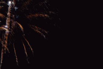 色彩斑斓的烟花晚上天空一年庆祝活动烟花摘要烟花孤立的黑色的背景免费的空间文本