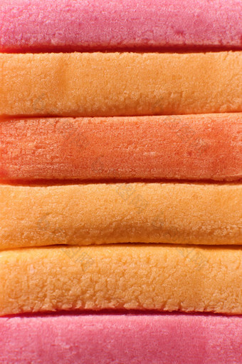 橙色桃子彩色的泡沫口香糖纹理新鲜橡皮糖美味的背景美味的背景宏特写镜头