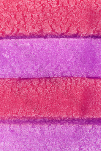 淡紫色粉红色的彩色的泡沫口香糖纹理新鲜橡皮糖美味的背景美味的背景宏特写镜头