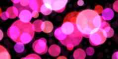 粉红色的散景背景发光模糊纹理发光的闪闪发光的背景