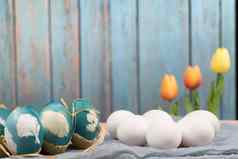 快乐复活节有机复活节鸡蛋等待绘画蓝色的