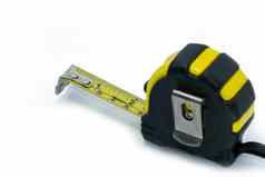 可伸缩的黄色的金属测量磁带孤立的白色背景测量表达了厘米脚建设测量仪器