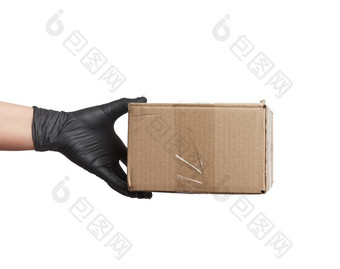 女手黑色的乳胶手套持有纸板盒子棕色（的）