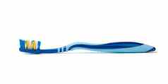 蓝色的塑料牙刷清洁口服腔