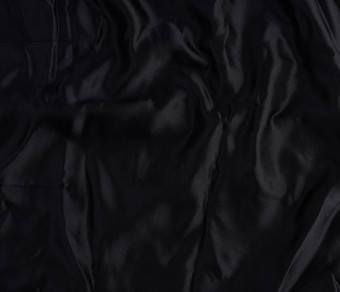 黑色的缎纺织织物一块织物缝纫窗帘