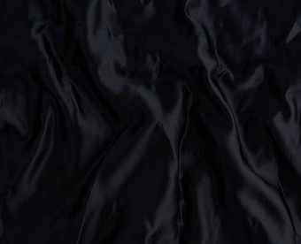 黑色的缎纺织织物一块织物缝纫窗帘