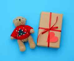 棕色（的）礼物盒子棕色（的）泰迪熊蓝色的背景