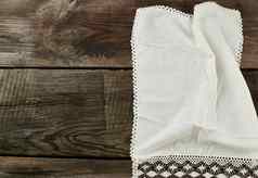白色厨房纺织毛巾折叠灰色的木表格