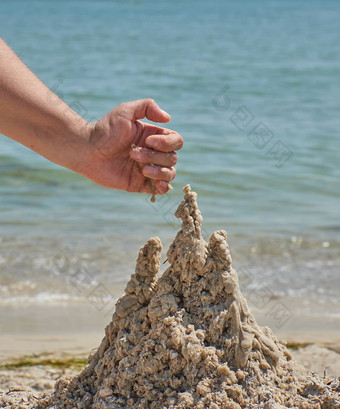 手构建<strong>城堡</strong>湿海<strong>沙子</strong>海滩