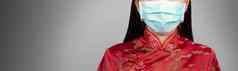 亚洲女人中国人服装穿卫生面具复制