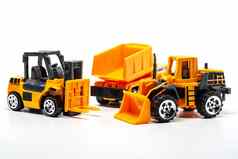 黄色的玩具重机械包括转储卡车推土机叉车