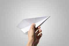 女人手飞镖纸飞机孤立的白色背景