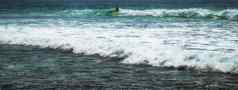 冲浪者骑波巴厘岛印尼水体育运动教训波