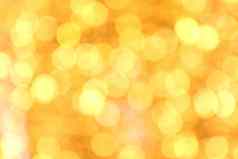 散景背景黄金黄色的色彩斑斓的快乐圣诞节快乐一年散景照明发光晚上背景散景闪闪发光的光黄金奢侈品背景纹理闪闪发光的壁纸